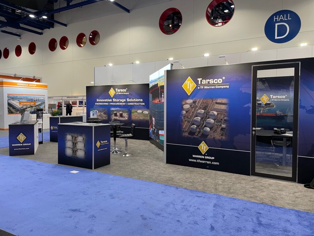 Side view of Tarsco’s trade show exhibit at Gastech featuring detailed branding and meeting spaces.